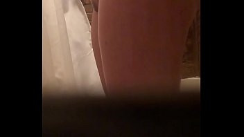 Play Voyeured wife in shower 35, scrubbing her feet. Please tell me what you think of her