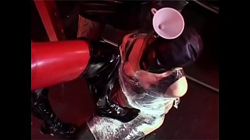 Play Cute filn-coated babe gets her pussy fucked by couple of strict mistresses in black